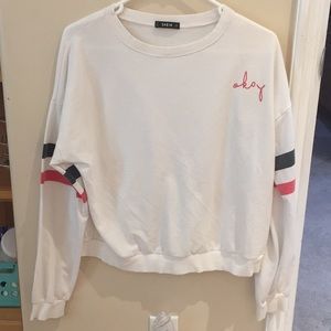white long sleeve top